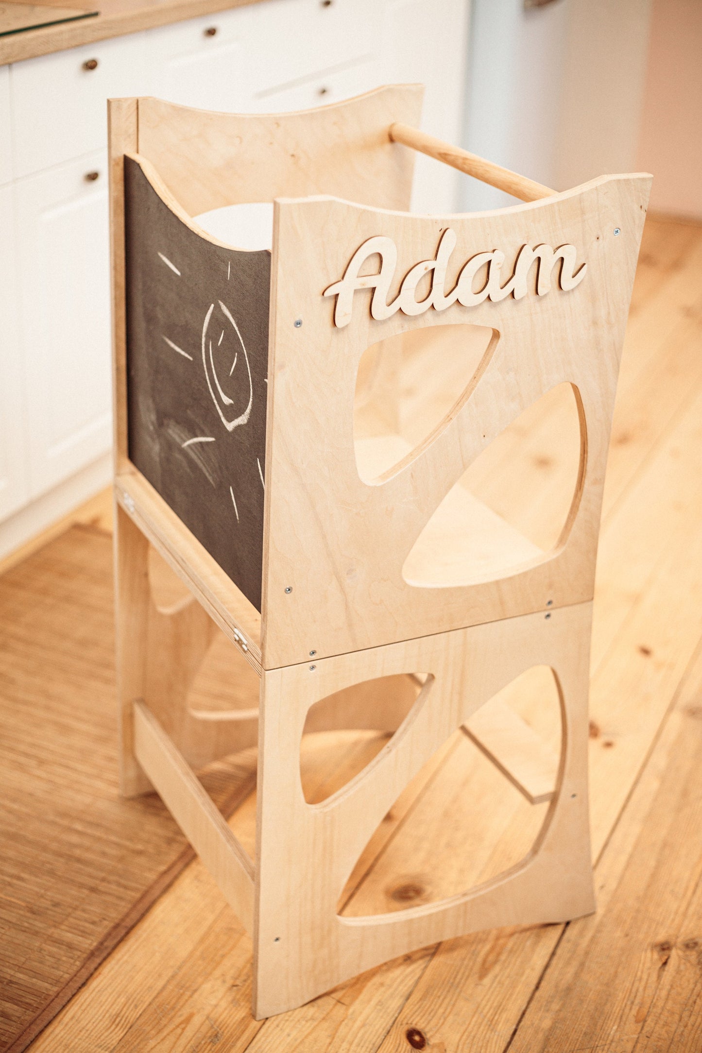 Wooden Kitchen Tower with Chalkboard and two chairs