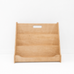 Wooden bookshelf with a handle on a white background
