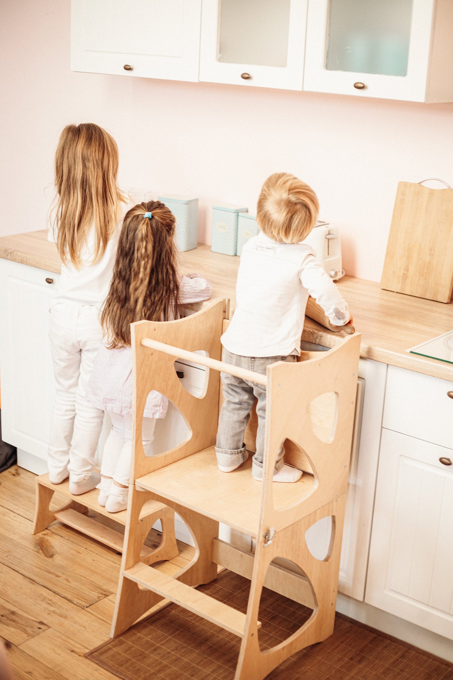 Wooden Kitchen Tower with Chalkboard and two chairs